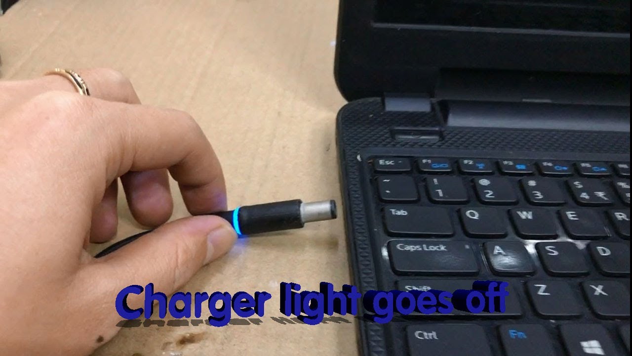 Dell Inspiron 3521 - Charger light goes off when plug it into the laptop