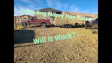 Unloading Heavy Bales of Hay with a Truck.