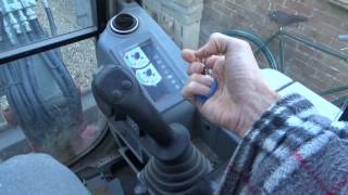 excavator controls and what they do