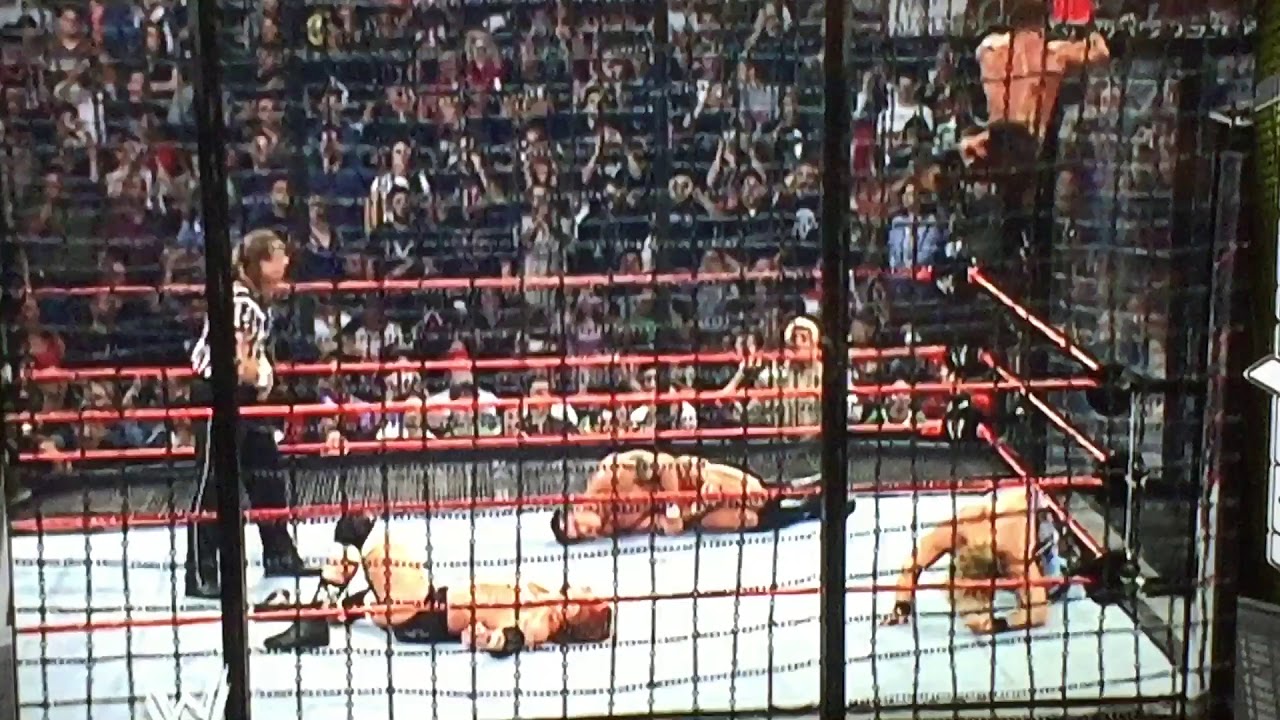 Chris Benoit diving headbutt from the top of the chamber pod! YouTube