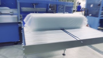 Hugo Beck - Film packaging of PET foodtainers in stacks