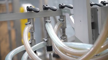 GLOBALTEK®: Fill-It 11 Head In-Line Automatic Pressure Overflow Filler with S/S Heavy Duty Frame.