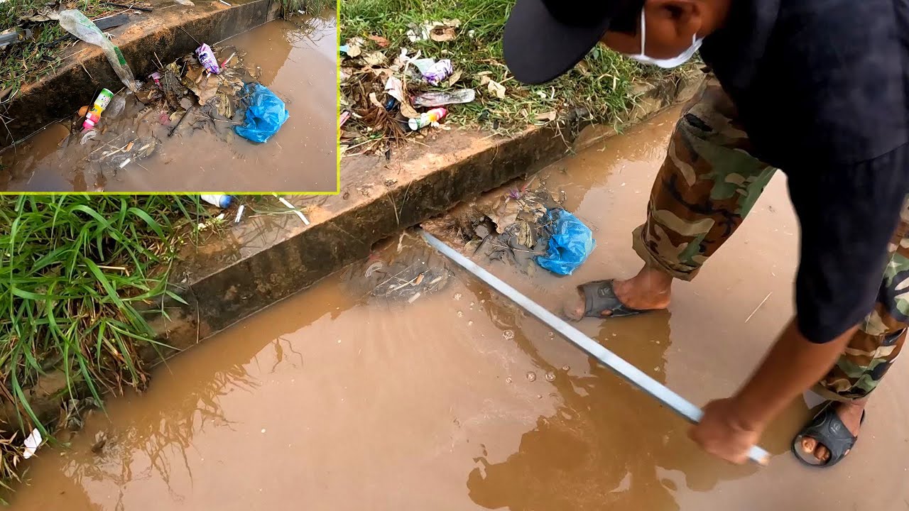 Unclogging a Massive Culvert Drain After Heavy Rainstorm on the Road ...