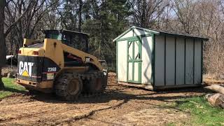 Moving a shed and grading with a Cat 236B