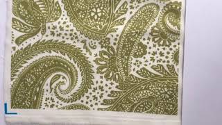 Paisley Positivity design (small white and olive version) printed on cotton poplin.