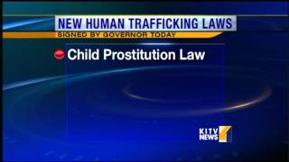 Governor signs four bills to tackle human trafficking