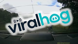 Oncoming Truck's Cargo Smacks Windscreen || ViralHog