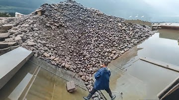Barge unloading 3880 tons of large cobblestones - Relaxing video, hard working workers
