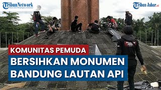 Mengenang, Sejumlah Pemuda Bersihkan Rumput dan Sampah di Monumen Bandung Lautan Api