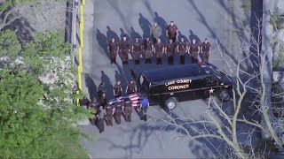 Security guard fatally shot patient and retired deputy during struggle, officials say