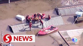 Authorities rescue horse stranded on rooftop in flooded Brazil