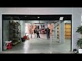 Elevate your home with our black aluminum glass garage door.