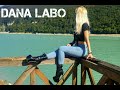 DANA LABO - walk to the lake of Bàrcis Italia in blue jeans and black shiny pvc boots