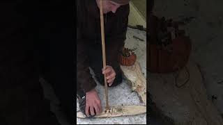 Handrill Fire under wet conditions winter bushcraft camping,  outdoor cooking