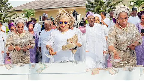 See The Moment Yoruba Actress Remi Surutu Dances And Sprays Money On Her Mom's Casket At Her Burial