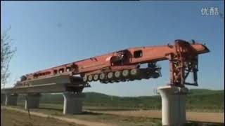 The Process Of Installing The Girders And Sleepers Along With The Rails In An Extra Fast