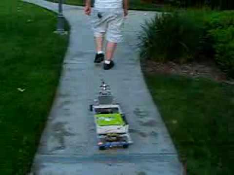 www.rischenterprizes.com -Automated Robot Transport follows me, this clips shows the robot following me around my appartment complex to stay behind me. He can carry 40lbs of payload. A Fuzzy logic controller implemented in a Xilinx Spartan 3 FPGA programmed in Verilog HDL see my website for more info