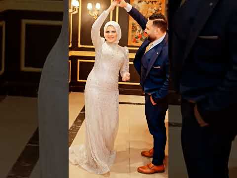 فستان زفاف برنسس دانتيل الفرنسي الفاخر والتول من اللؤلؤ والكريستال على الصدر شفافة طويل 