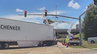 Louisiana utility worker left hanging after 18-wheeler crashes into bucket truck