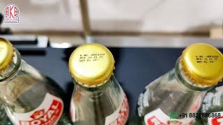 Automatic Batch Coding - Price, Date, Batch printing on metal crown of Soft Drink Glass Bottle