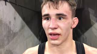 Davison junior wrestler Andrew Chambal reacts after D1 quarterfinal win at 119 pounds