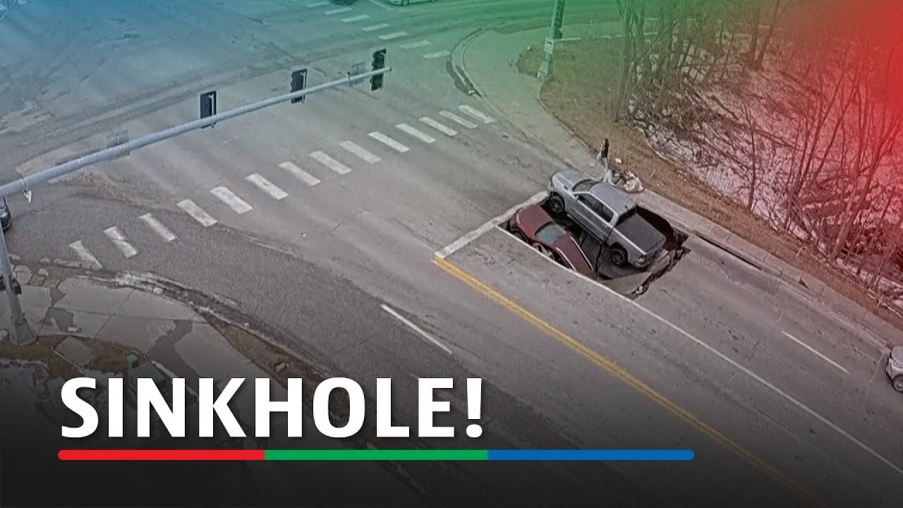 Sinkhole swallows vehicles at Nebraska traffic light