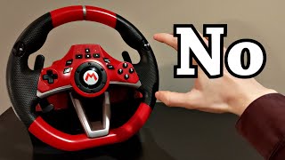 A Man Who Can't Drive plays Mario Kart with a Real Wheel