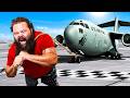 Worlds strongest man vs plane