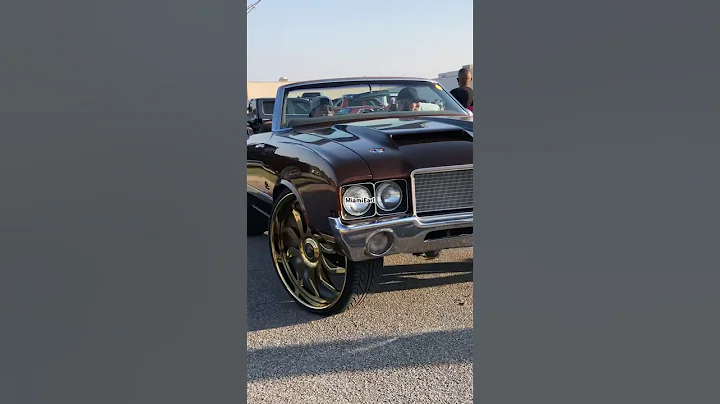 Oldsmobile Cutlass convertible on gold Forgiato wheels ￼