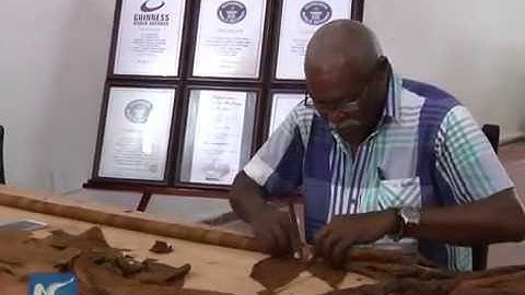 Cuban cigar roller attempts to roll the world