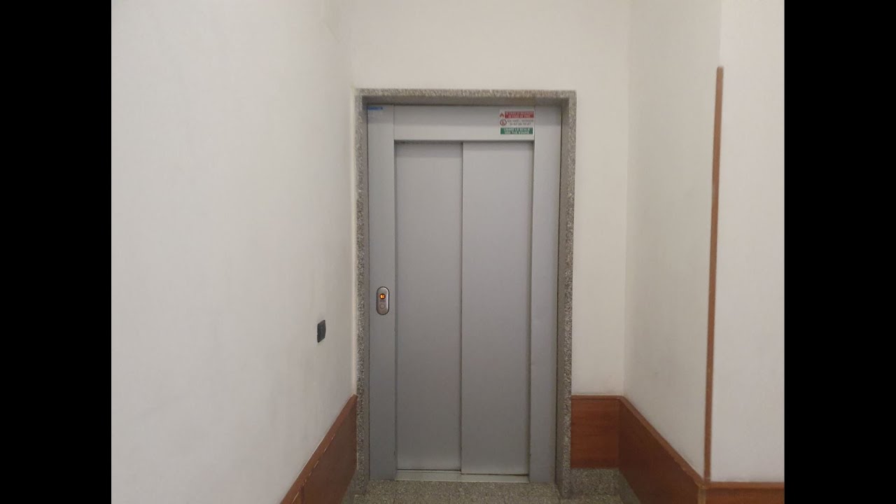 2 2004 Kone Monospace 500 MRL Traction Elevators, one broken@Artemis Building C, Fiumicino, Italy