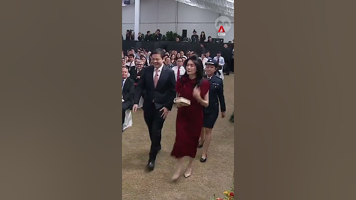 Prime Minister Lawrence Wong and wife Loo Tze Lui arrive at Cabinet swearing-in ceremony