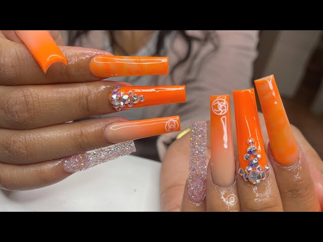 Vibrant Neon Orange Glitter Nails