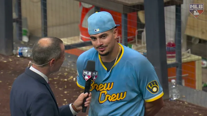 Willy Adames talks with JP Morosi after making Brewers history