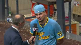 Willy Adames talks with JP Morosi after making Brewers history