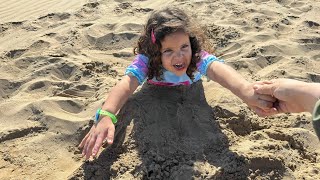 I'm stuck in the sand: Je suis bloqué dans le sable