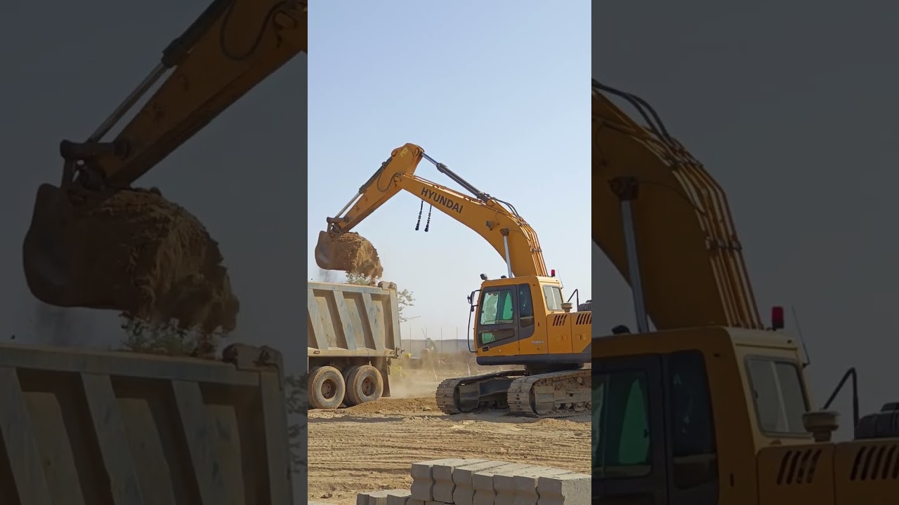 Hyundai excavator truck loading work. 