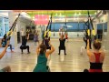 Приседания на TRX.