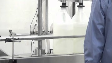 Overflow filler semiautomatic machine with 0750 inches overflow nozzles by Acasi Machinery 2