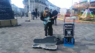 Eastbourne rocks  , Meg Helstrip  , busking at  Xmas