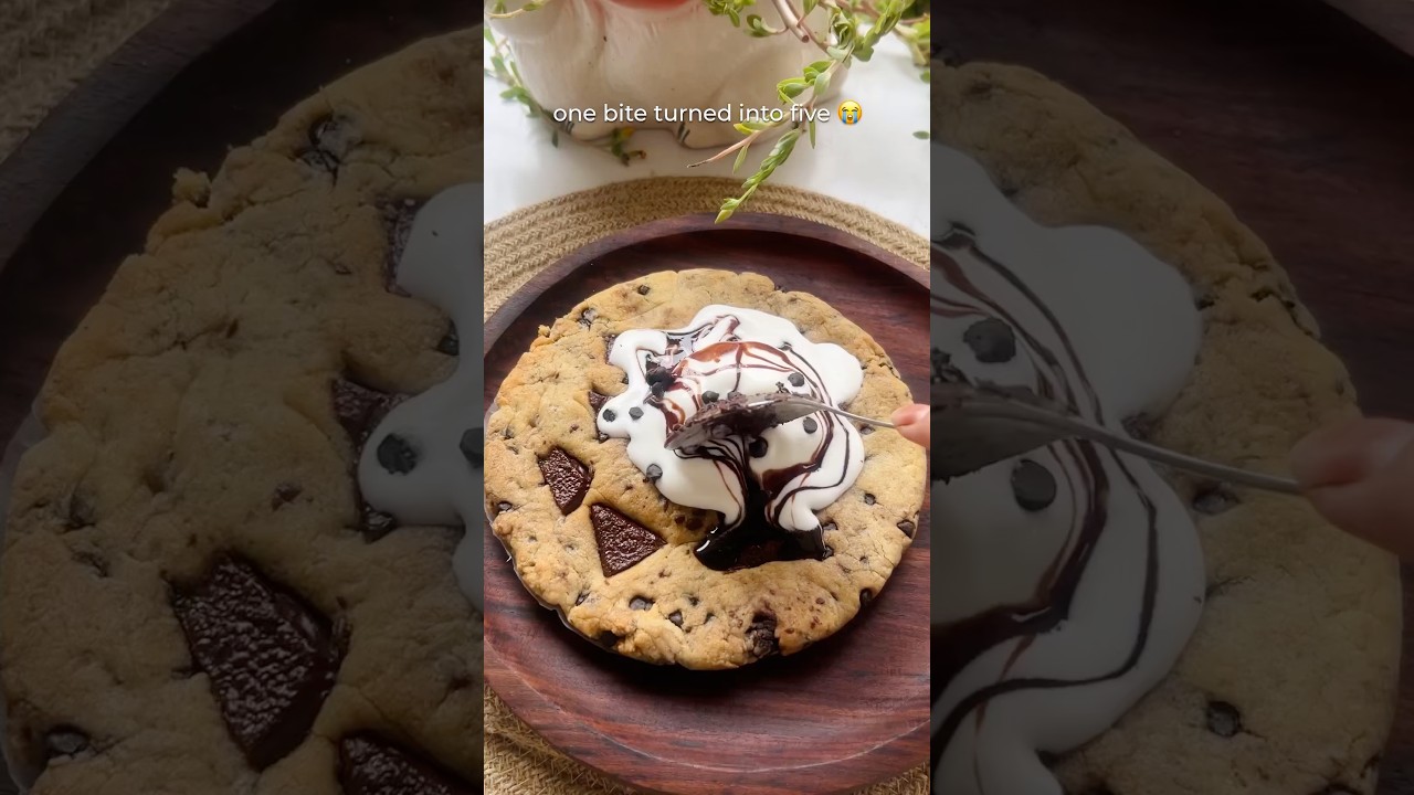 Warm chocolate chip cookie skillet topped with vanilla ice c