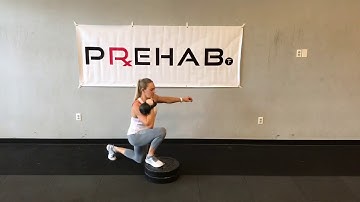 Single Arm Kettlebell Front Rack Alternating Elevated Reverse Lunges