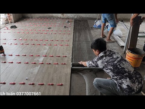 Quá trình lát sàn gạch nền vân gỗ 15x90 máng kéo răng cưa chuẩn đẹp 99%