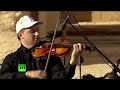 Валерий Гергиев выступает с симфоническим оркестром в Пальмире 5 мая 2016 года