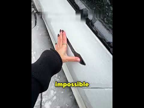 Tesla's FROZEN door handle problem explained 🥶