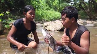 Survival in forest, Catch two fish by hand for food of survival, Fish soup chili for lunch