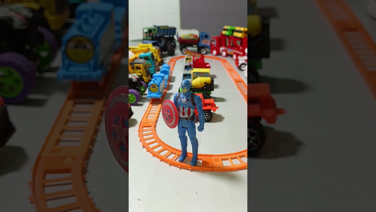 kereta api mainan, bus telolet, bus oleng, molen, truk oleng, truk pasir, mobil mobilan, excavator