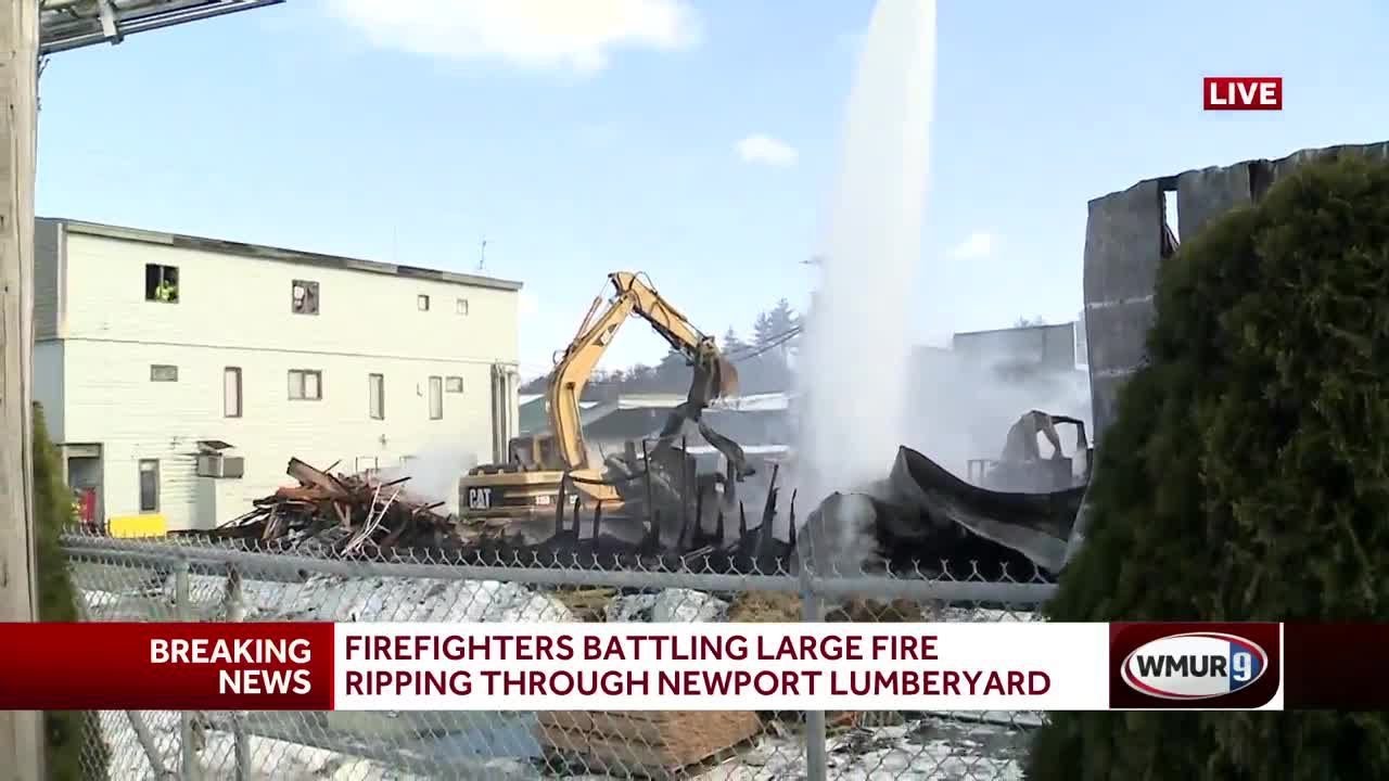 Firefighters battle large fire at Newport lumber yard - YouTube