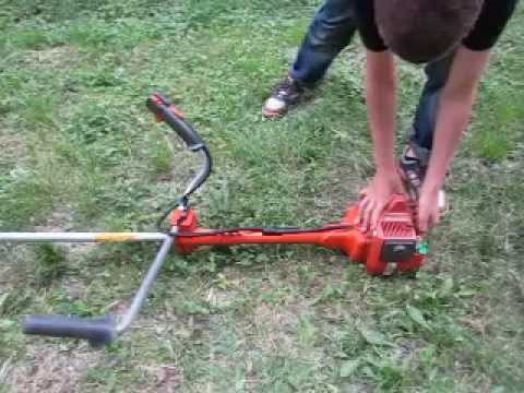 9 year old starts weed eater Husqvarna 225 R - YouTube