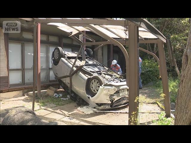 Car plunges off cliff in residential area; man in his 90s in